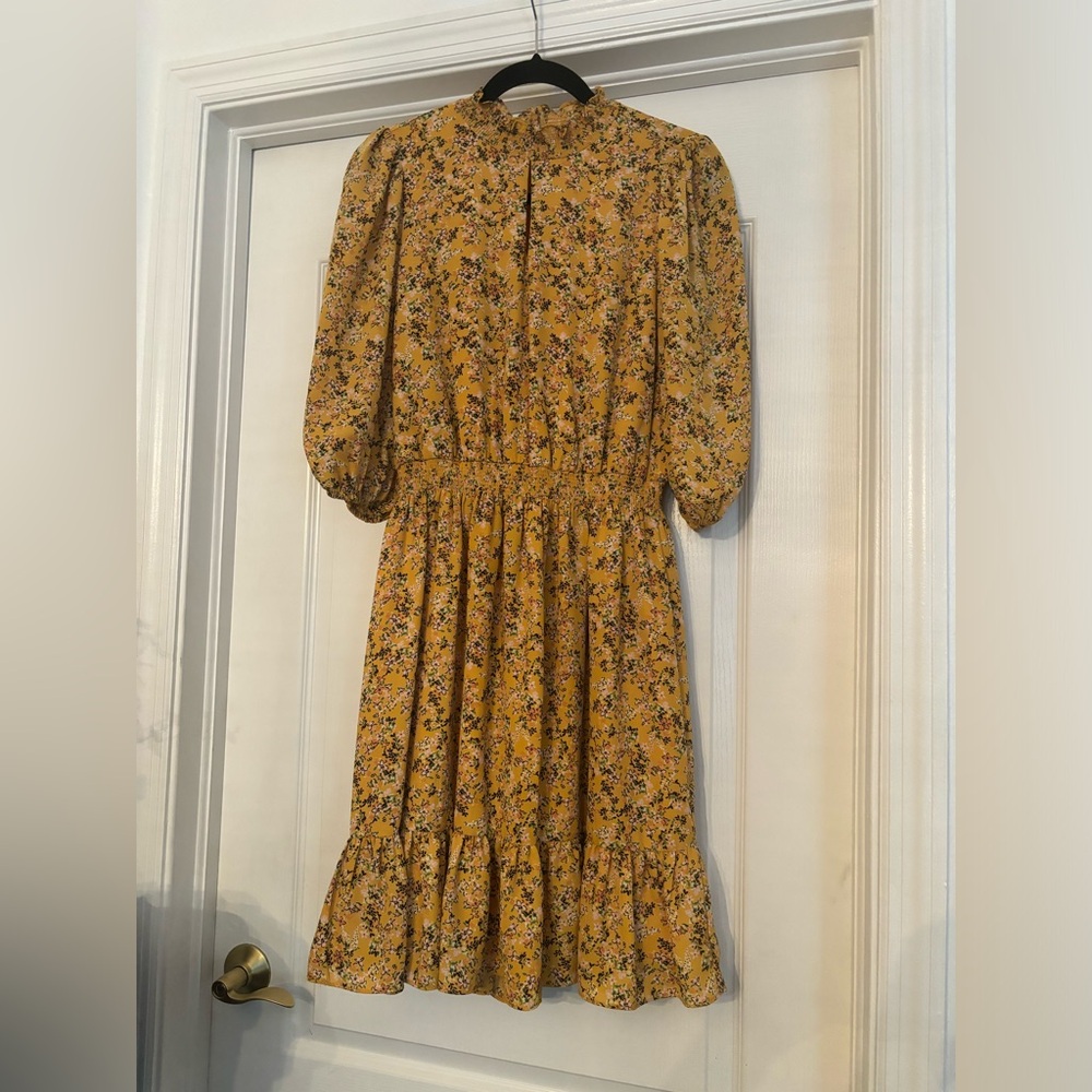 Pretty women’s mustard yellow floral dress
